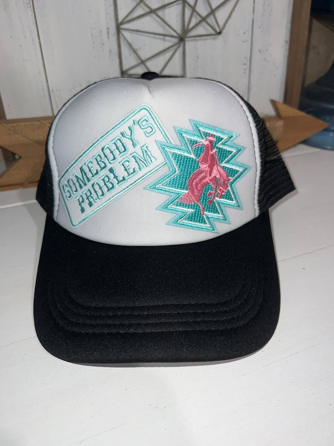 SOMEBODY'S PROBLEM TRUCKER